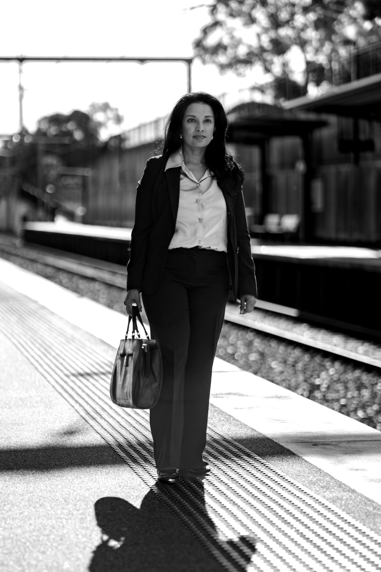 Ishara Saldin walking along a station platform